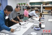 在线日历两岸艺术家在安徽“共绘一幅画”
